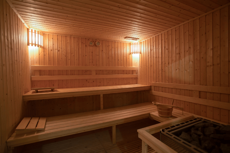indoor at home sauna with plenty of seating