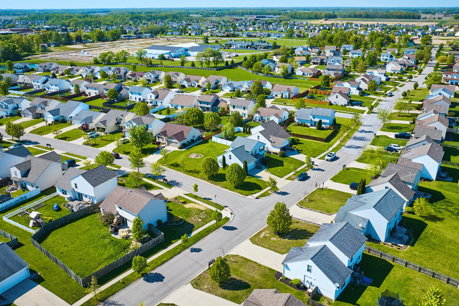 rows of suburban homes in a large neighborhood