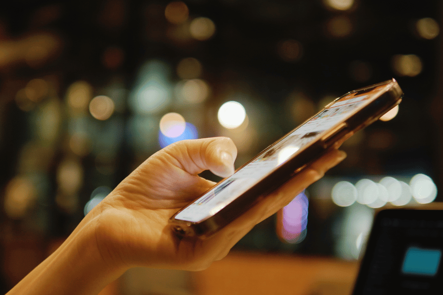 person engaging with social media on smartphone